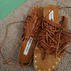 Never worn Steve Madden flat with fringe size 7